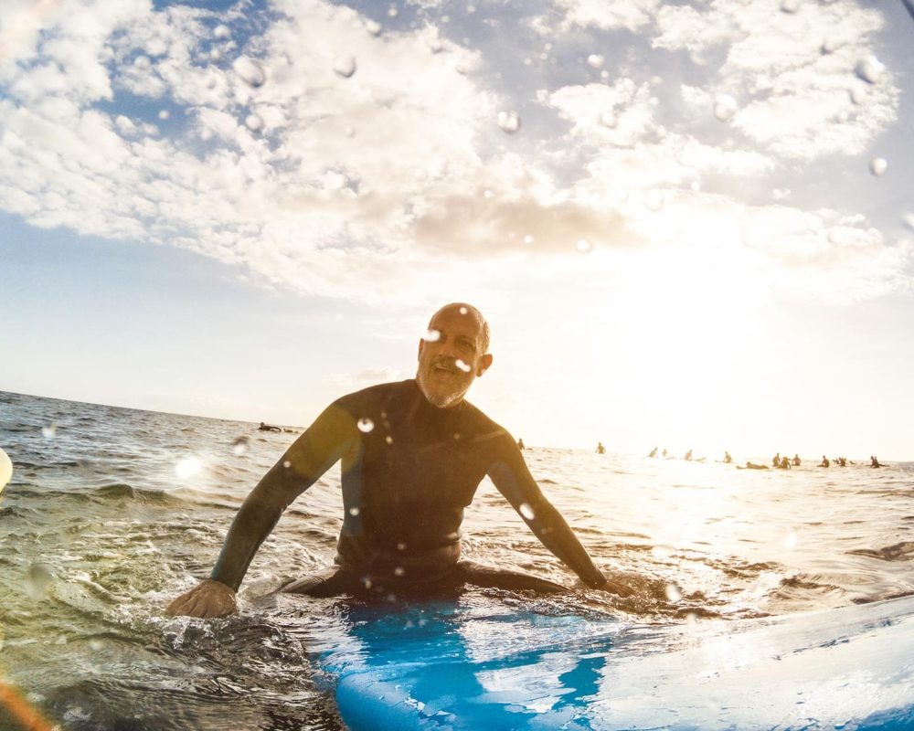 young-man-waiting-for-waves-at-surf-location-spot-2022-12-09-04-46-59-utc